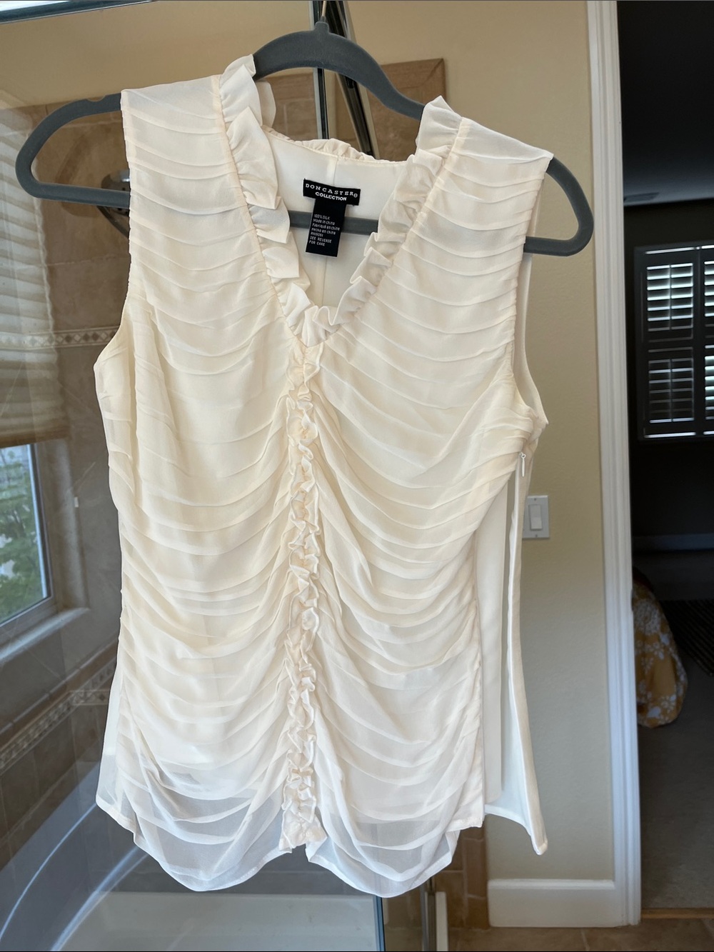 Doncaster Collection ivory sleeveless